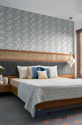 Scandinavian bedroom with floral wallpaper, cane headboard, and oak wood bed frame in Ashoka Windows and Annexe Kaggadasapura 3 BHK apartment Bengaluru