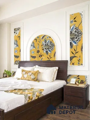 Traditional bedroom with mustard floral wallpaper panels and dark wood bed