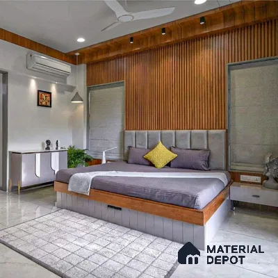 Modern bedroom with walnut wood fluted wall panels and grey upholstered bed