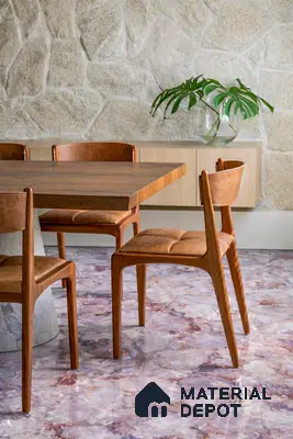 Mid-century modern dining room with brown leather chairs, wood table, stone cladding wall, and purple marble floor tiles
