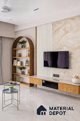 Modern living room with marble-look tile flooring, wood laminate TV unit, and beige marble laminate accent wall