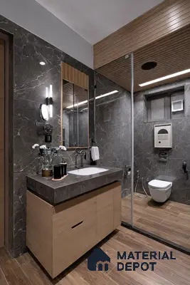 Modern bathroom with grey marble wall tiles, wood-look floor tiles, and light oak vanity