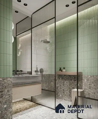 Modern bathroom with sage green vertical subway wall tiles and grey terrazzo floor and wall tiles