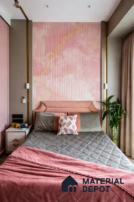 Modern bedroom with blush pink marble wallpaper, suede upholstered bed, and gold accent trims