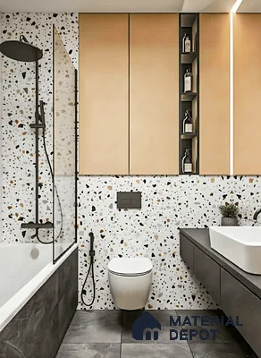 Modern bathroom with terrazzo wall tiles, matte beige cabinets, and charcoal grey floor tiles in Brigade Buena Vista Old Madras Road 4 BHK apartment Bengaluru