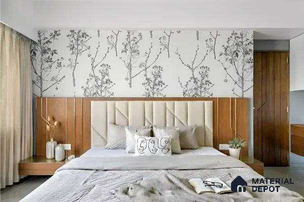 Modern bedroom with floral wallpaper, beige suede upholstered headboard, and walnut wood laminate in Brigade Buena Vista Old Madras Road 4 BHK apartment Bengaluru