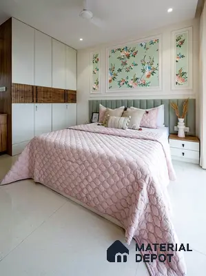 Eclectic bedroom with floral wallpaper, pastel green upholstered headboard, and dual tone wardrobe with wood accents in 3 BHK apartment Brigade Northridge Yelahanka Bengaluru