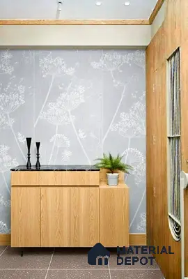 Scandinavian foyer with light oak laminate console, floral wallpaper, and speckled brown floor tiles in 3 BHK apartment Brigade Northridge Yelahanka Bengaluru