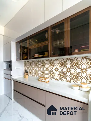 Modern kitchen with glossy taupe laminate, white quartz countertop, and brown geometric patterned backsplash tiles