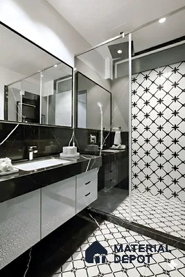 Modern bathroom with black marble vanity, white gloss cabinets, and black-and-white geometric patterned tiles of 3 BHK apartment in Candeur Carlisle Narayanapura Bengaluru