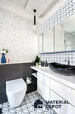 Modern bathroom with terrazzo wall tile, geometric patterned floor tile, and white vanity of 3 BHK apartment in Candeur Carlisle Narayanapura Bengaluru