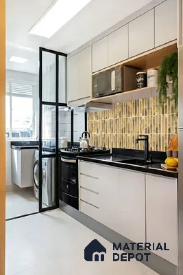 Modern kitchen with beige kitkat backsplash tile, frosty white laminate cabinets, and black granite countertop of 3 BHK apartment in Candeur Carlisle Narayanapura Bengaluru