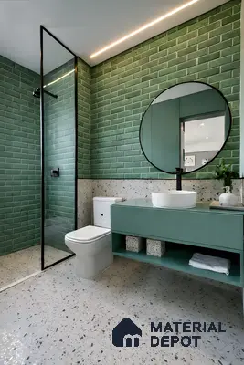 Modern bathroom with green subway wall tiles, terrazzo floor tiles, and matte green vanity