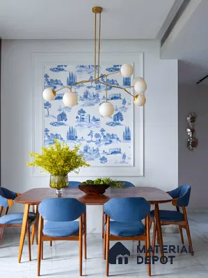 Mid-century modern dining room with blue chinoiserie wallpaper, walnut wood dining set, and white marble floor tile
