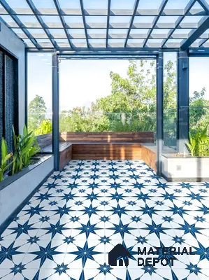 Modern outdoor terrace with blue geometric patterned floor tiles and wooden bench seating in 4 BHK apartment Casagrand Luxus K R Puram Bengaluru