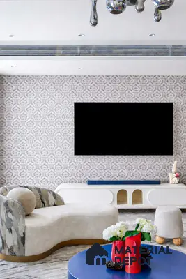 Modern living room with damask patterned wallpaper and curved upholstered sofa