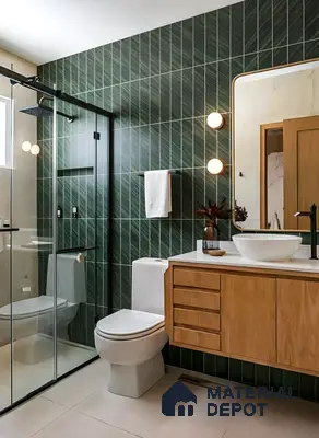 Modern bathroom with green diagonal wall tiles, light wood vanity, and white countertop in Commanders Galaxy Thanisandra Main Road 3 BHK apartment Bengaluru