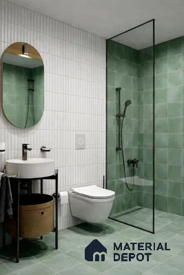 Modern bathroom with sage green wall and floor tiles, white fluted wall tiles, and black fixtures