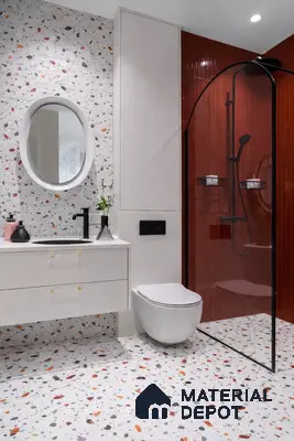 Modern bathroom with terrazzo wall and floor tiles, red kitkat wall tiles, and floating white vanity