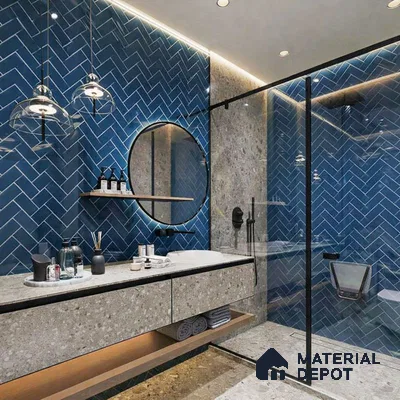 Modern bathroom with blue herringbone subway wall tiles and terrazzo vanity