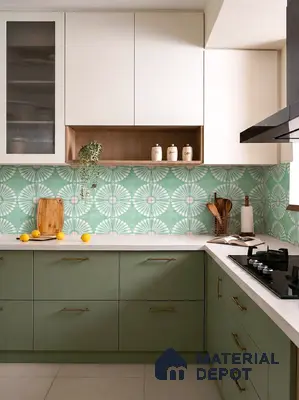 Modern kitchen with sage green laminate, white quartz countertop, and green geometric patterned backsplash tile