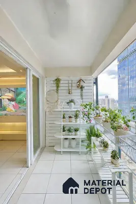 Scandinavian balcony with white slatted wall panels, ceramic planters, and ivory floor tiles