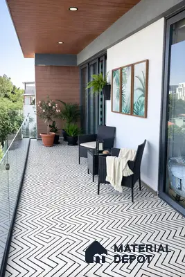 Modern balcony with geometric black-and-white floor tiles and wood ceiling panels