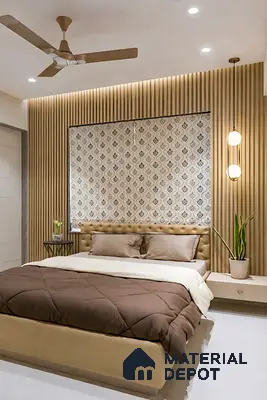 Modern bedroom with beige tufted bed, light wood fluted wall panels, and patterned wallpaper accent