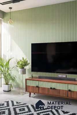 Mid-century modern living room with sage green fluted wall panels and walnut wood TV unit of 2 BHK apartment in DNR Casablanca Narayanapura Bengaluru