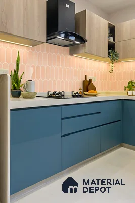 Modern kitchen with blue matte laminate, light wood laminate, and pastel pink scallop backsplash tiles of 3 BHK apartment in Dsr Spring Brookefield in Bengaluru