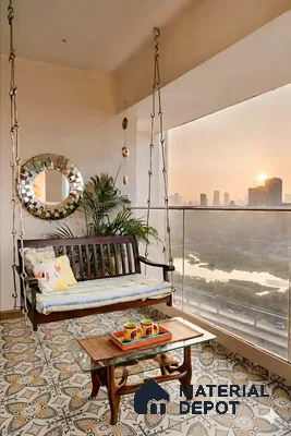 Bohemian balcony with patterned moroccan floor tiles and wooden swing seating of 3 BHK apartment in Dsr lotus towers whitefield Bengaluru