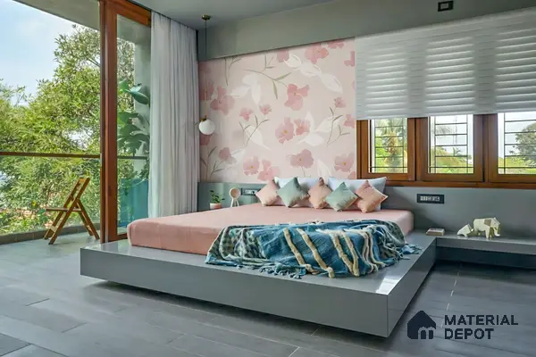Scandinavian bedroom with pastel floral wallpaper and grey wood-look floor tiles