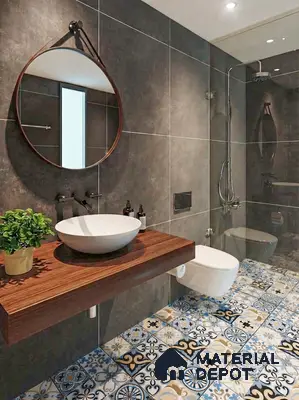 Modern bathroom with dark stone wall tiles, patterned moroccan floor tiles, and wooden floating vanity