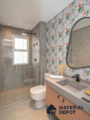 Modern bathroom with tropical floral highlighter wall tiles and grey stone-look tiles