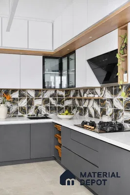 Modern kitchen with marble-look patterned backsplash tile, white quartz countertop, and grey matte laminate cabinets