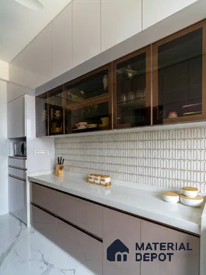 Modern kitchen with glossy taupe and white laminate, white quartz countertop, and geometric patterned backsplash tile