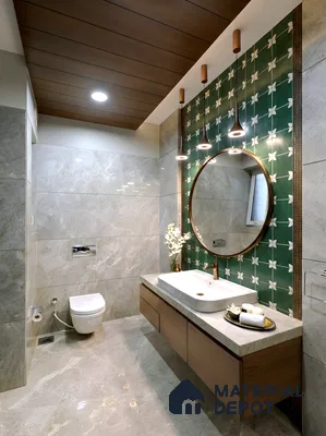Modern bathroom with green floral highlighter wall tile, beige marble wall and floor tiles, and wooden floating vanity