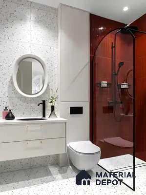 Modern bathroom with terrazzo wall and floor tiles, red vertical subway shower tiles, and floating white vanity