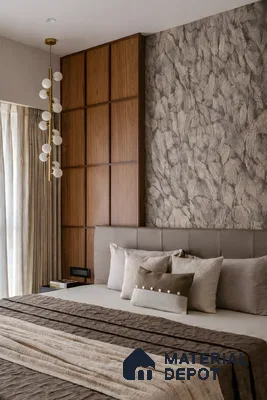Modern bedroom with walnut wood laminate panel, textured wallpaper, and taupe upholstered headboard