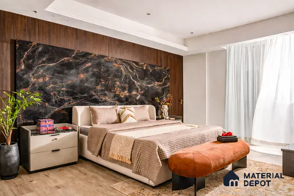 Modern bedroom with black marble-look laminate accent wall and walnut wood laminate paneling