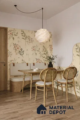 Scandinavian dining room with floral wallpaper, natural wood table, and light oak wood flooring