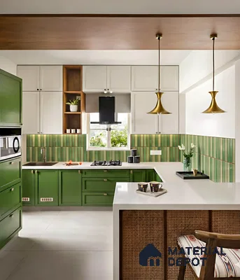 Modern kitchen with olive green laminate, white quartz countertop, and striped green backsplash tile of 3 BHK apartment in Garuda Park Square KR Puram in Bengaluru