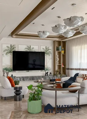 Modern living room with marble floor, tropical wallpaper, and floating marble TV ledge of 3 BHK apartment in Garuda Park Square KR Puram in Bengaluru