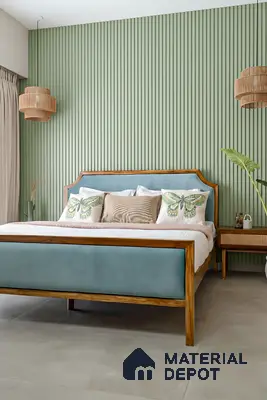 Scandinavian bedroom with sage green fluted wall panels, light wood bed frame, and pastel blue suede upholstery of 3 BHK apartment in Garuda Royal Homes KR Puram in Bengaluru