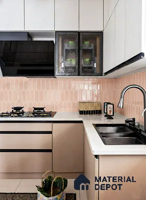 Modern kitchen with blush pink laminate, white quartz countertop, and pastel pink scallop backsplash tiles of 3 BHK apartment in Garuda Royal Homes KR Puram in Bengaluru