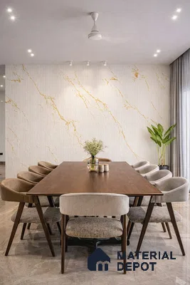 Modern dining room with gold vein marble look accent wall and walnut wood dining table