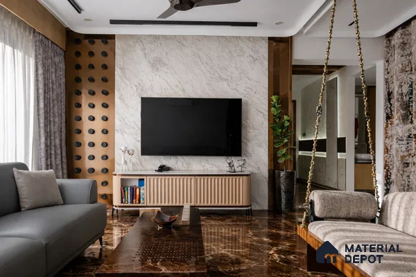 Modern living room with marble-look TV wall, brown marble floor tile, and fluted beige laminate TV unit