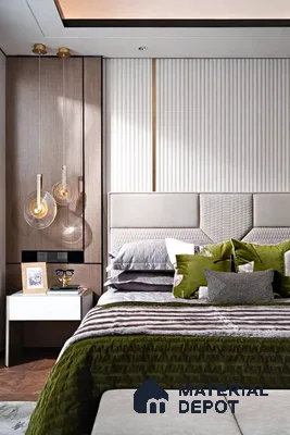 Modern bedroom with olive green velvet bedding, beige suede upholstered headboard, and fluted white wall panels
