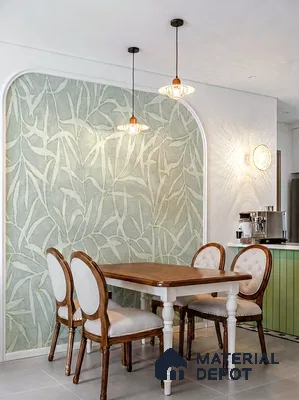 Eclectic dining room with pastel green botanical wallpaper and classic wood dining set