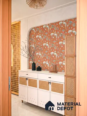 Scandinavian foyer with terracotta floral wallpaper, white cabinet, and cane panel accents